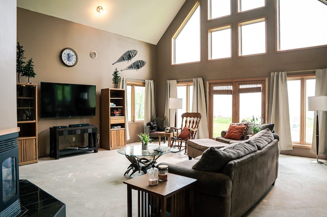 10804 Splithand Rd, Wildwood Twp, MN 55744 - living room featuring high vaulted ceiling and concrete floors