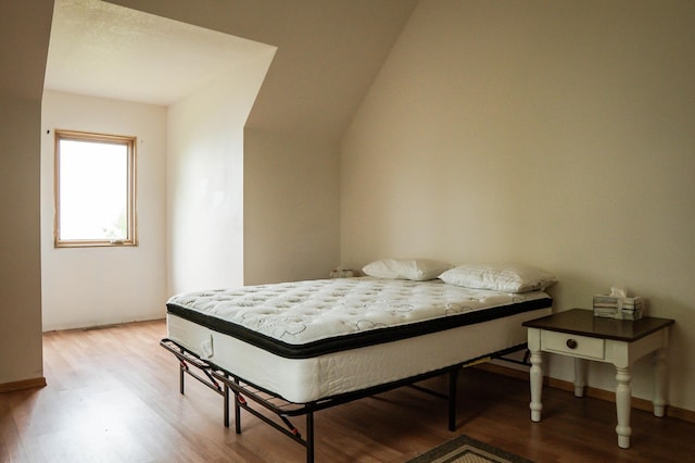 10804 Splithand Rd, Wildwood Twp, MN 55744 - bedroom with wood finished floors and baseboards