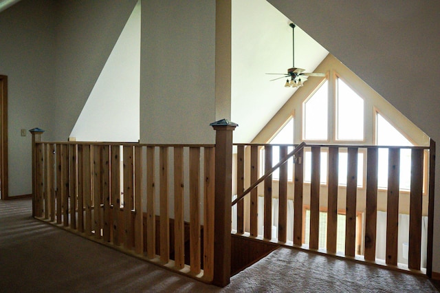 10804 Splithand Rd, Wildwood Twp, MN 55744 - stairway featuring vaulted ceiling, a ceiling fan, and carpet floors