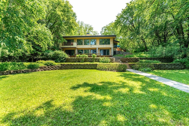 28647 State Highway 78, Otter Tail Twp, MN 56515 - view of green lawn with a balcony