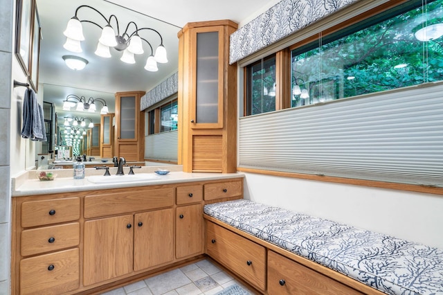 28647 State Highway 78, Otter Tail Twp, MN 56515 - bathroom featuring vanity, tile patterned floors, and a chandelier