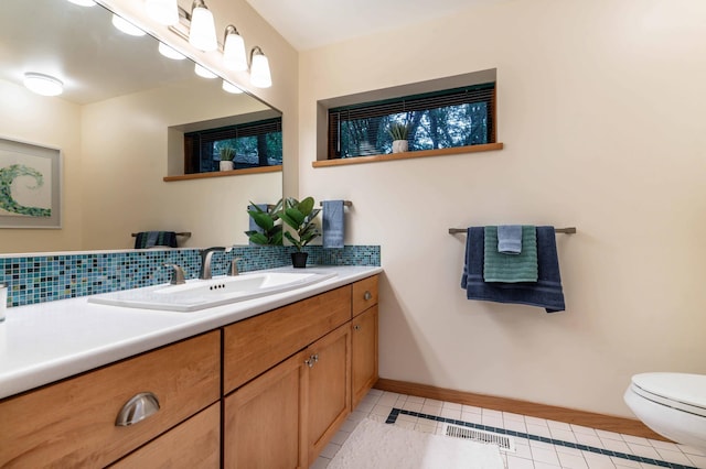 28647 State Highway 78, Otter Tail Twp, MN 56515 - bathroom featuring backsplash, vanity, and tile patterned flooring