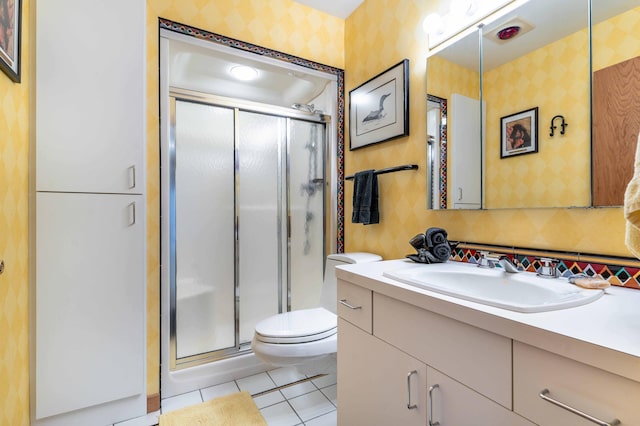 28647 State Highway 78, Otter Tail Twp, MN 56515 - bathroom with wallpapered walls, vanity, a shower stall, and tile patterned flooring