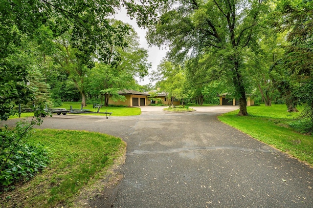28647 State Highway 78, Otter Tail Twp, MN 56515 - view of home's community with curved driveway and a yard