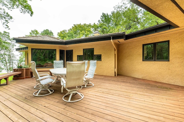 28647 State Highway 78, Otter Tail Twp, MN 56515 - wooden terrace with outdoor dining space