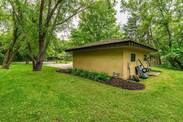 28647 State Highway 78, Otter Tail Twp, MN 56515 - view of side of home with stucco siding and a yard