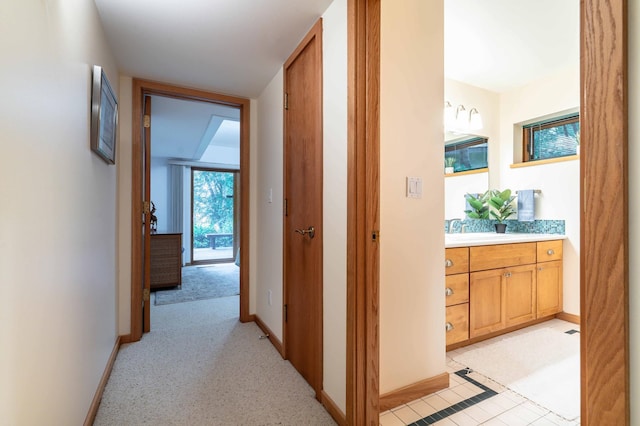 28647 State Highway 78, Otter Tail Twp, MN 56515 - hallway with a sink and light carpet