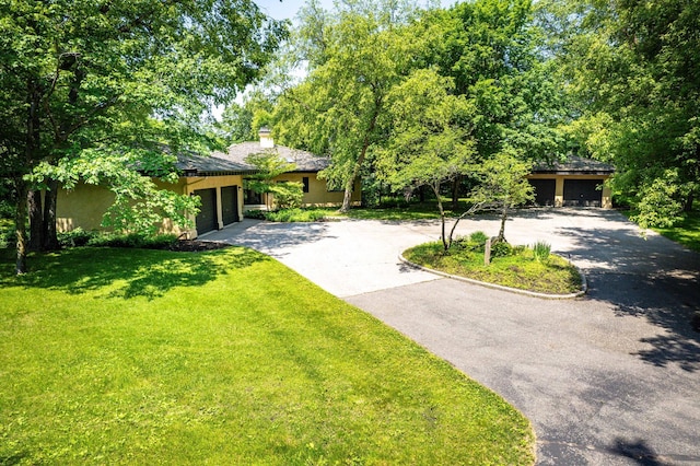 28647 State Highway 78, Otter Tail Twp, MN 56515 - view of green lawn featuring driveway and an attached garage