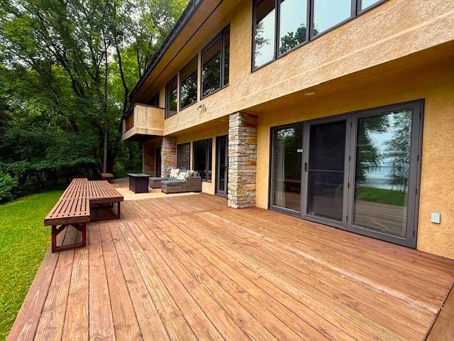 28647 State Highway 78, Otter Tail Twp, MN 56515 - wooden deck with outdoor lounge area and a lawn