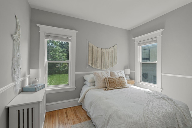 141 Rustic Ldg W, Minneapolis, MN 55419 - bedroom featuring light wood-style flooring and baseboards