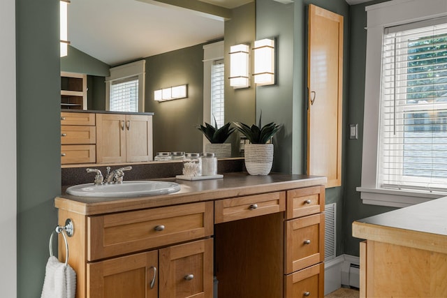 141 Rustic Ldg W, Minneapolis, MN 55419 - bathroom with vanity and vaulted ceiling