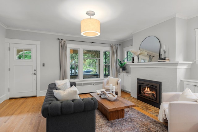 141 Rustic Ldg W, Minneapolis, MN 55419 - living area featuring plenty of natural light, light wood-style floors, crown molding, and a brick fireplace