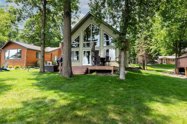 12088 Sylvan Dr SW, Pillager, MN 56473 - rear view of property with a deck and a yard