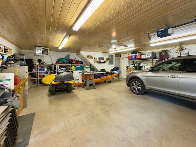 12088 Sylvan Dr SW, Pillager, MN 56473 - garage with a garage door opener and wood ceiling