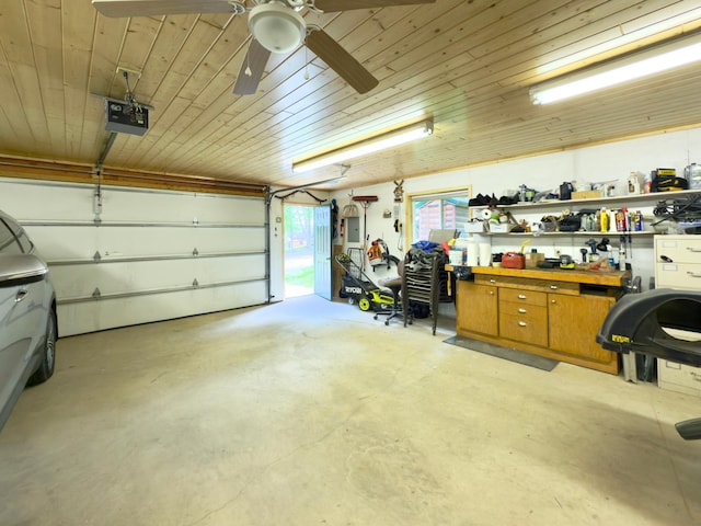 12088 Sylvan Dr SW, Pillager, MN 56473 - garage featuring a garage door opener, wooden ceiling, and ceiling fan