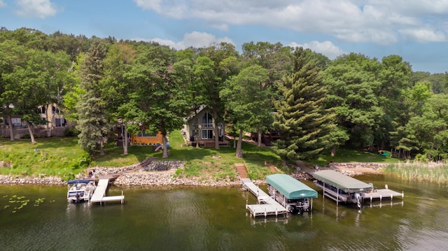 12088 Sylvan Dr SW, Pillager, MN 56473 - dock featuring a water view, boat lift, a forest view, and a yard