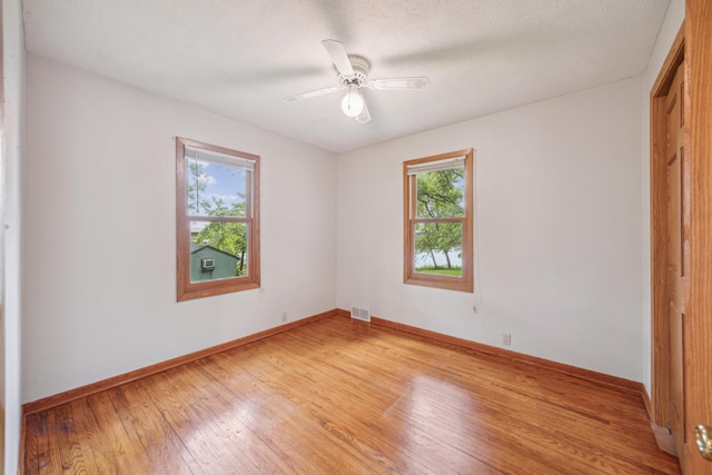 16584 River Rd, Green Prairie Twp, MN 56345 - unfurnished bedroom featuring light wood-type flooring and ceiling fan