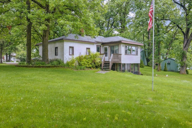 16584 River Rd, Green Prairie Twp, MN 56345 - view of front of property with a front lawn, a chimney, and stucco siding
