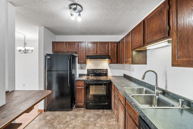 66 9th St E Unit 1806, Saint Paul, MN 55101 - kitchen with black appliances, under cabinet range hood, dark countertops, a textured ceiling, and a chandelier