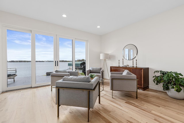 4919 Three Points Blvd, Mound, MN 55364 - living area with light wood-style floors, a water view, and recessed lighting