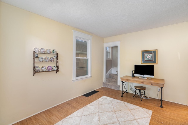 190 Annapolis St E, West Saint Paul, MN 55118 - office space with wood finished floors and a textured ceiling