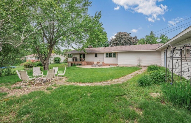2434 Southcrest Ave E, Maplewood, MN 55119 - view of green lawn with a patio area