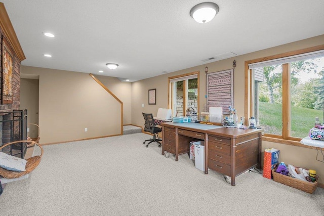 2434 Southcrest Ave E, Maplewood, MN 55119 - carpeted office space featuring a brick fireplace, baseboards, and recessed lighting