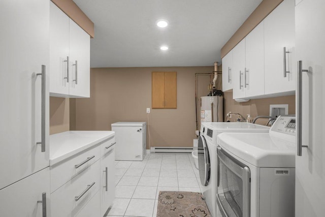 2434 Southcrest Ave E, Maplewood, MN 55119 - laundry area featuring washer and clothes dryer, cabinet space, a baseboard radiator, water heater, and recessed lighting