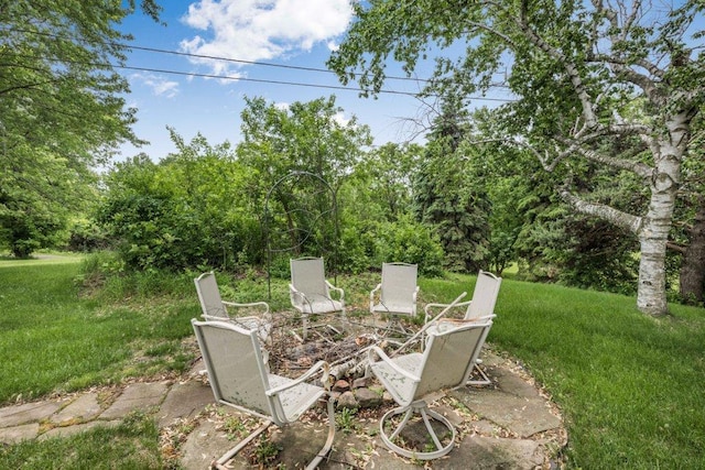 2434 Southcrest Ave E, Maplewood, MN 55119 - view of patio / terrace featuring an outdoor fire pit