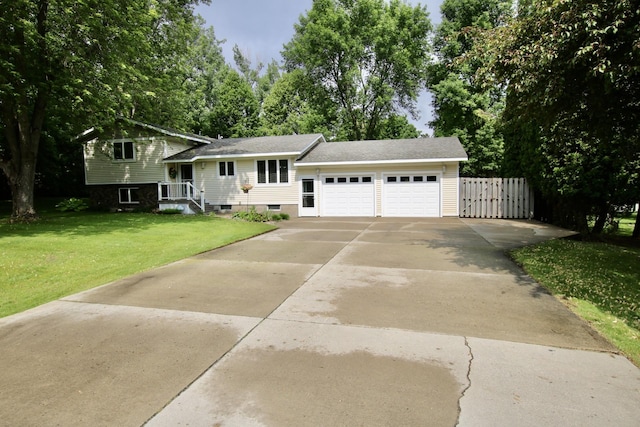 4210 Heritage Ln NE, Alexandria, MN 56308 - tri-level home featuring a garage and concrete driveway