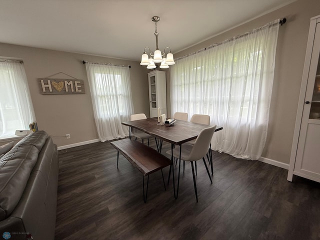 409 1st Ave E, Ada, MN 56510 - dining room featuring a chandelier and dark wood-style flooring
