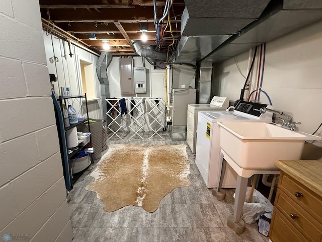 409 1st Ave E, Ada, MN 56510 - unfinished basement featuring washing machine and dryer and concrete block wall