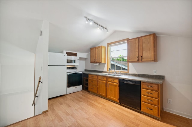 5578 Cloquet Rd, Midway Twp, MN 55810 - kitchen with white appliances, lofted ceiling, rail lighting, light wood-style floors, and dark countertops