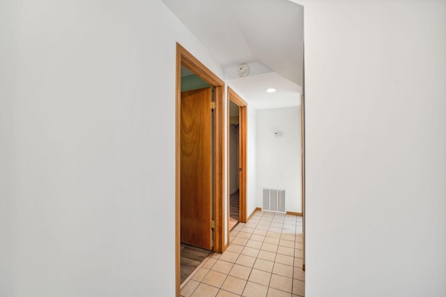 5578 Cloquet Rd, Midway Twp, MN 55810 - hallway featuring light tile patterned floors and lofted ceiling