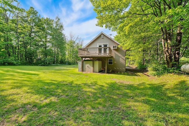 5578 Cloquet Rd, Midway Twp, MN 55810 - rear view of house with a wooden deck and a lawn