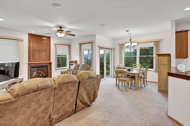 755 Hickory Way Unit 2, Lake City, MN 55041 - living area with a chandelier, light carpet, recessed lighting, ceiling fan, and a glass covered fireplace