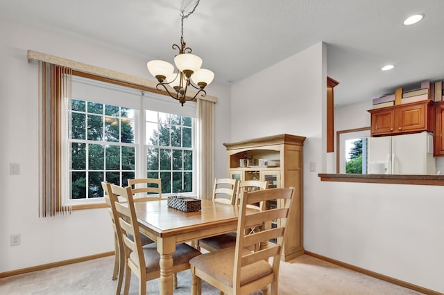 755 Hickory Way Unit 2, Lake City, MN 55041 - dining room with a chandelier, light colored carpet, and recessed lighting