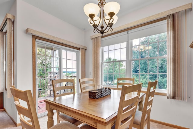 755 Hickory Way Unit 2, Lake City, MN 55041 - dining space with healthy amount of natural light and a chandelier