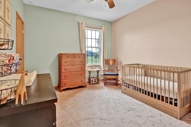755 Hickory Way Unit 2, Lake City, MN 55041 - bedroom with carpet floors, a nursery area, and ceiling fan