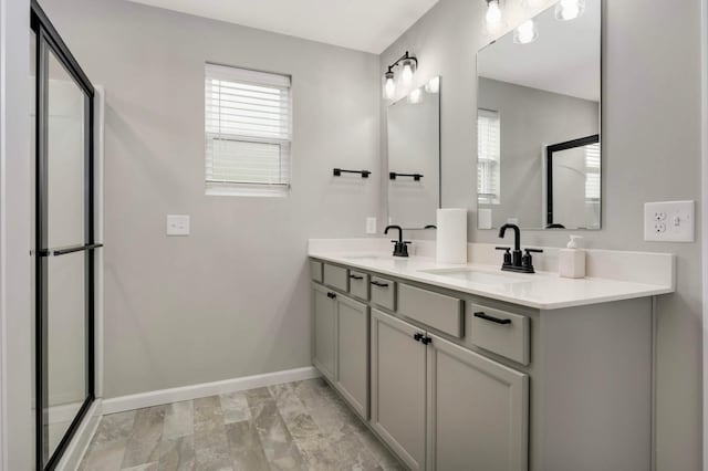 17983 Giants Way, Lakeville, MN 55044 - bathroom featuring double vanity and marble finish flooring