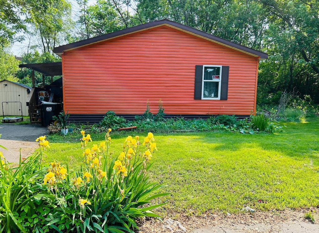 4644 Prior Cir, Arden Hills, MN 55112 - view of side of home featuring a lawn