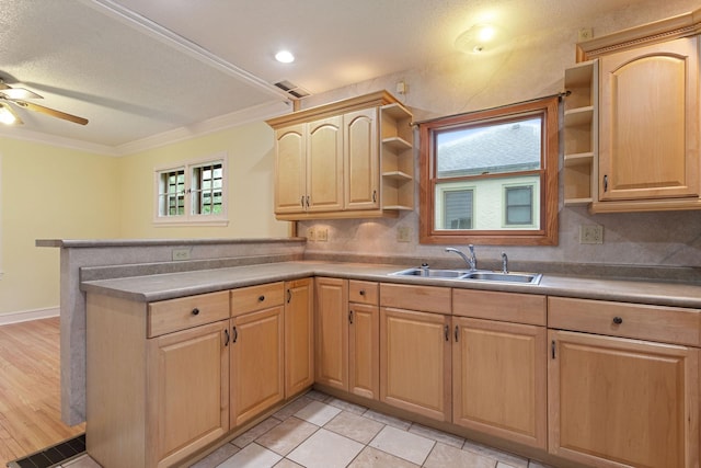 332 Riverside Dr NE, Saint Cloud, MN 56304 - kitchen featuring open shelves, light brown cabinets, ornamental molding, a peninsula, and a ceiling fan