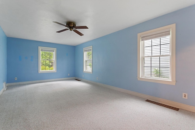 332 Riverside Dr NE, Saint Cloud, MN 56304 - empty room with a ceiling fan and carpet