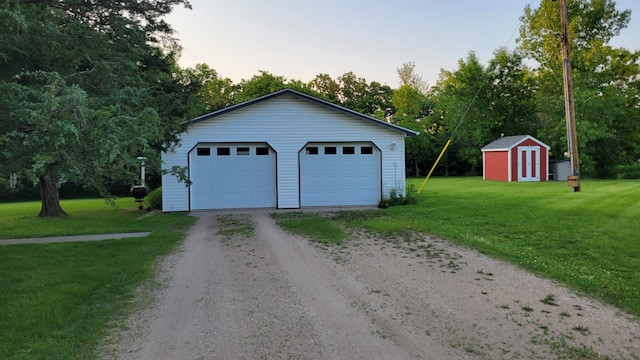 112 240th St N, Eglon Twp, MN 56549 - detached garage with a shed
