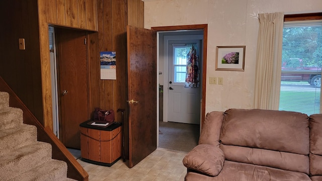 112 240th St N, Eglon Twp, MN 56549 - entrance foyer featuring stairs and wooden walls