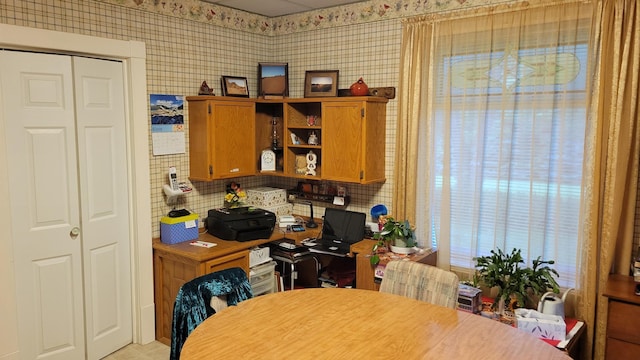 112 240th St N, Eglon Twp, MN 56549 - kitchen featuring brown cabinetry, open shelves, tasteful backsplash, and an office area