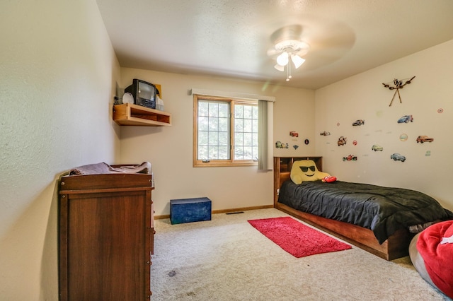 2607 Forest View Dr NE, Bemidji, MN 56601 - bedroom featuring carpet, baseboards, and a ceiling fan