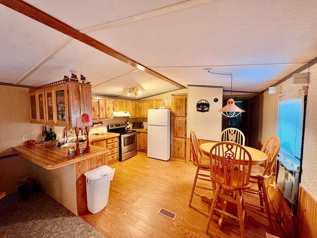 2683 22nd St NW Lot 8, Baudette, MN 56623 - kitchen featuring stainless steel electric stove, freestanding refrigerator, light wood finished floors, under cabinet range hood, and brown cabinetry