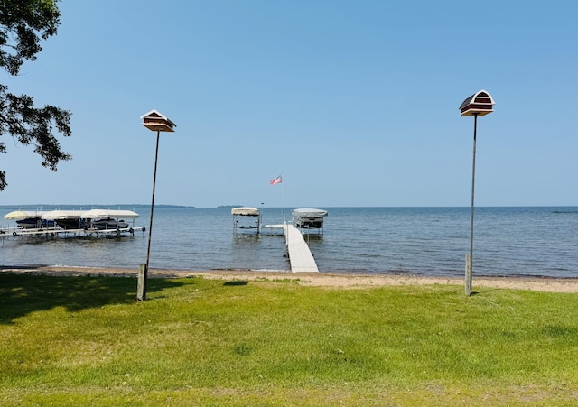 15127 Twilight Rd, Kathio Twp, MN 56359 - dock with a water view and a lawn