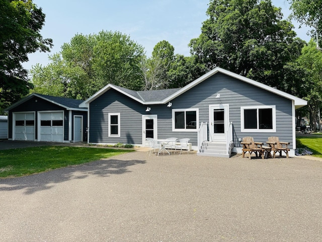 15127 Twilight Rd, Kathio Twp, MN 56359 - view of front of house with a garage and entry steps